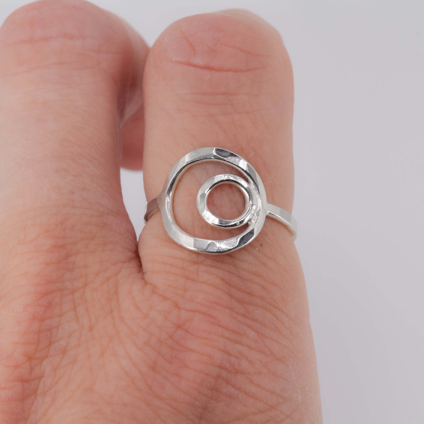 Sterling Silver Nested Circle Ring worn on finger - Jeanine Erickson