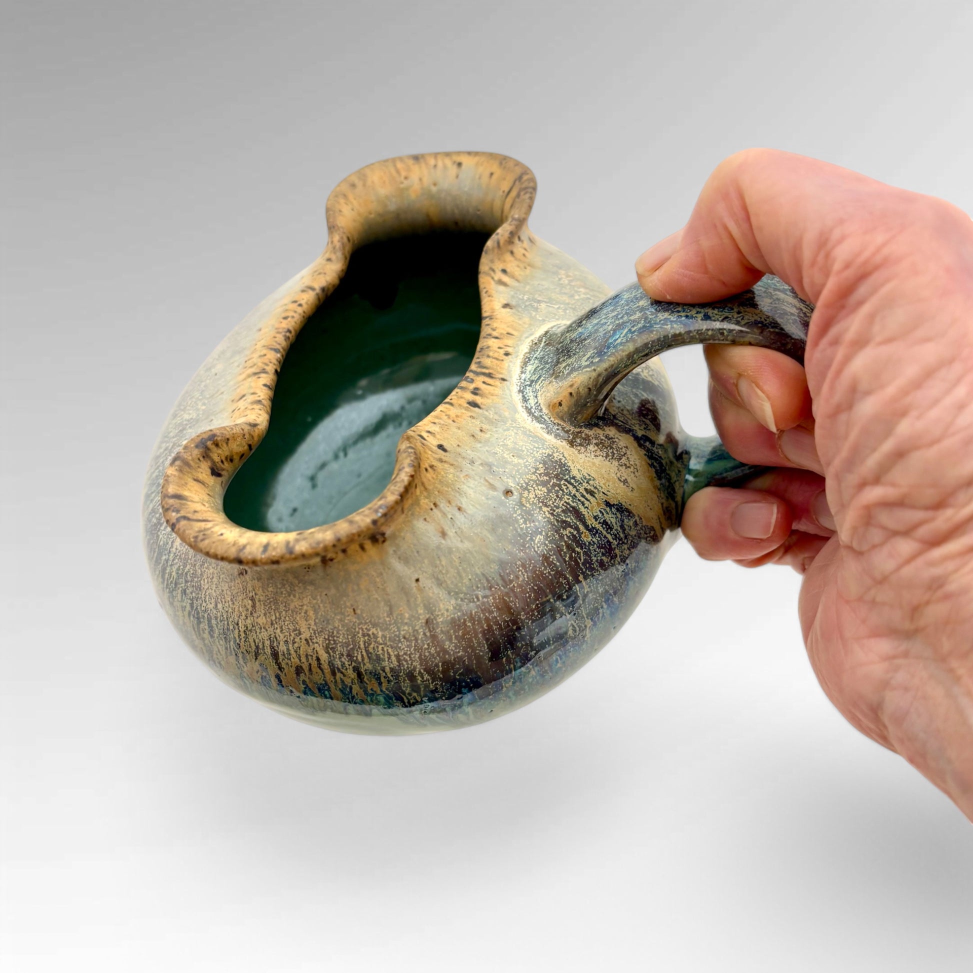 Green Gravy Bowl held in hand for scale - Judy Musicant