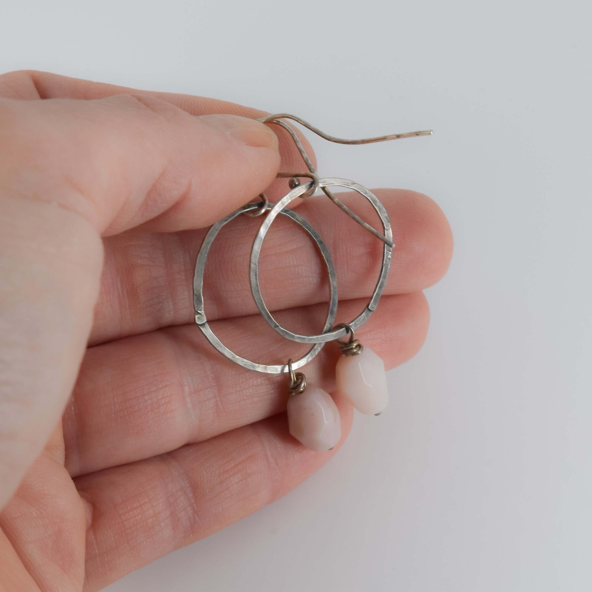 Pink Opal Earrings shown in hand for scale - Brooke VanDerzee